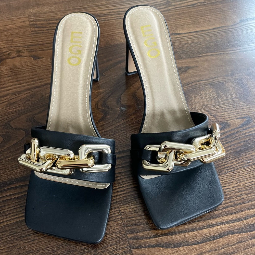 EGO Black and Gold “Link Up” Mule Sandal | US Size 9